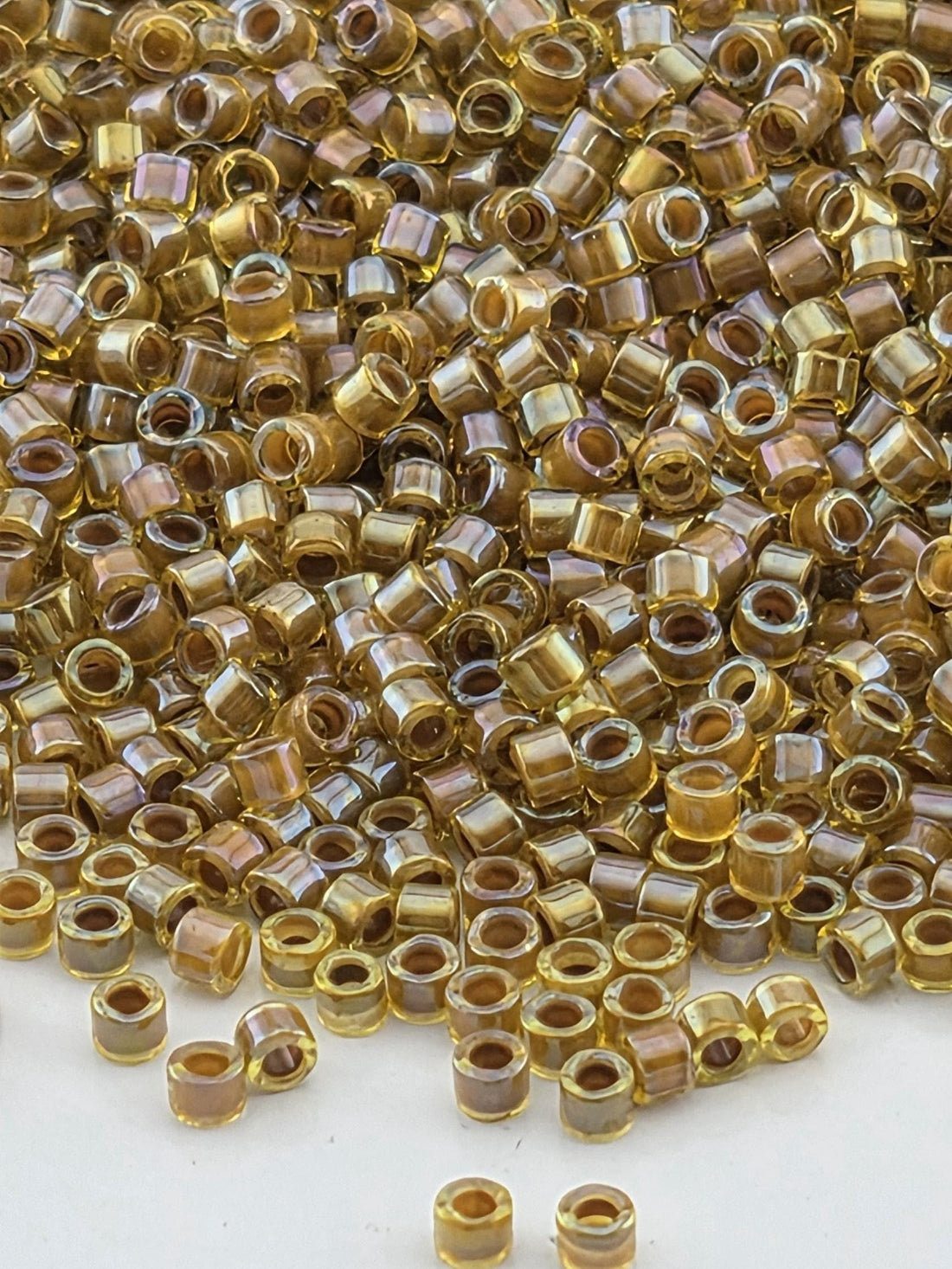DB1738:Peridot/Amber Inside Color Lined Rainbow | Size 11/0 | 7g
