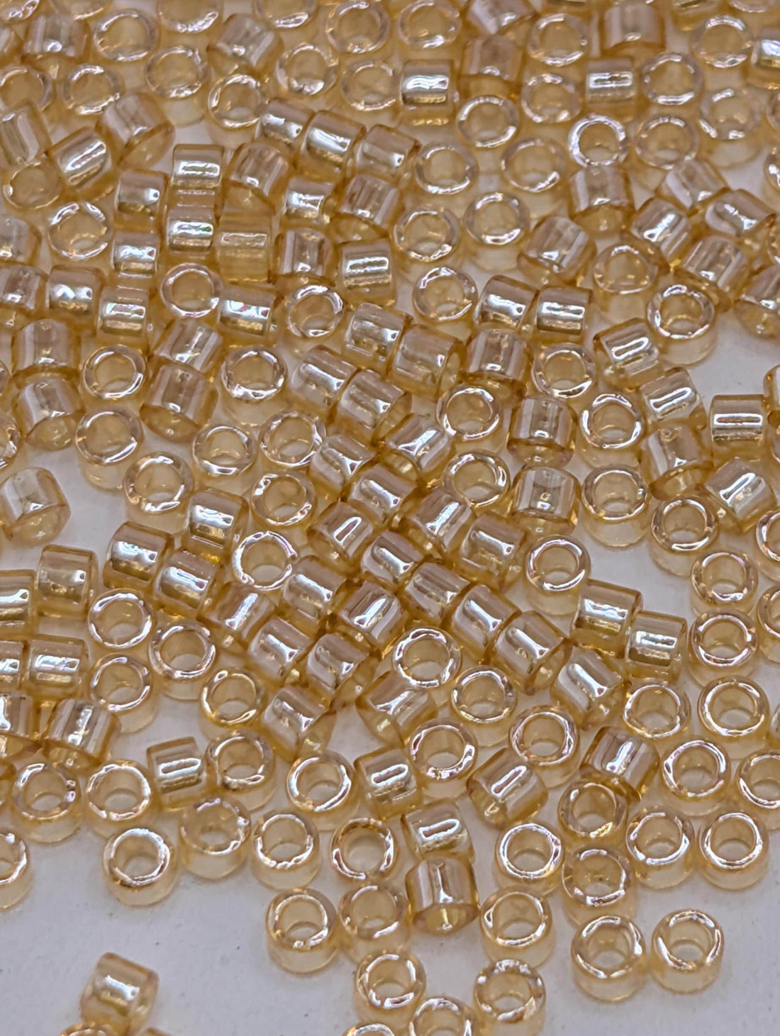 DB0099:Pale Amber Translucent Inside Color Lined | Size 11/0 | 7g