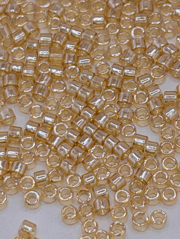 DB0099:Pale Amber Translucent Inside Color Lined | Size 11/0 | 7g