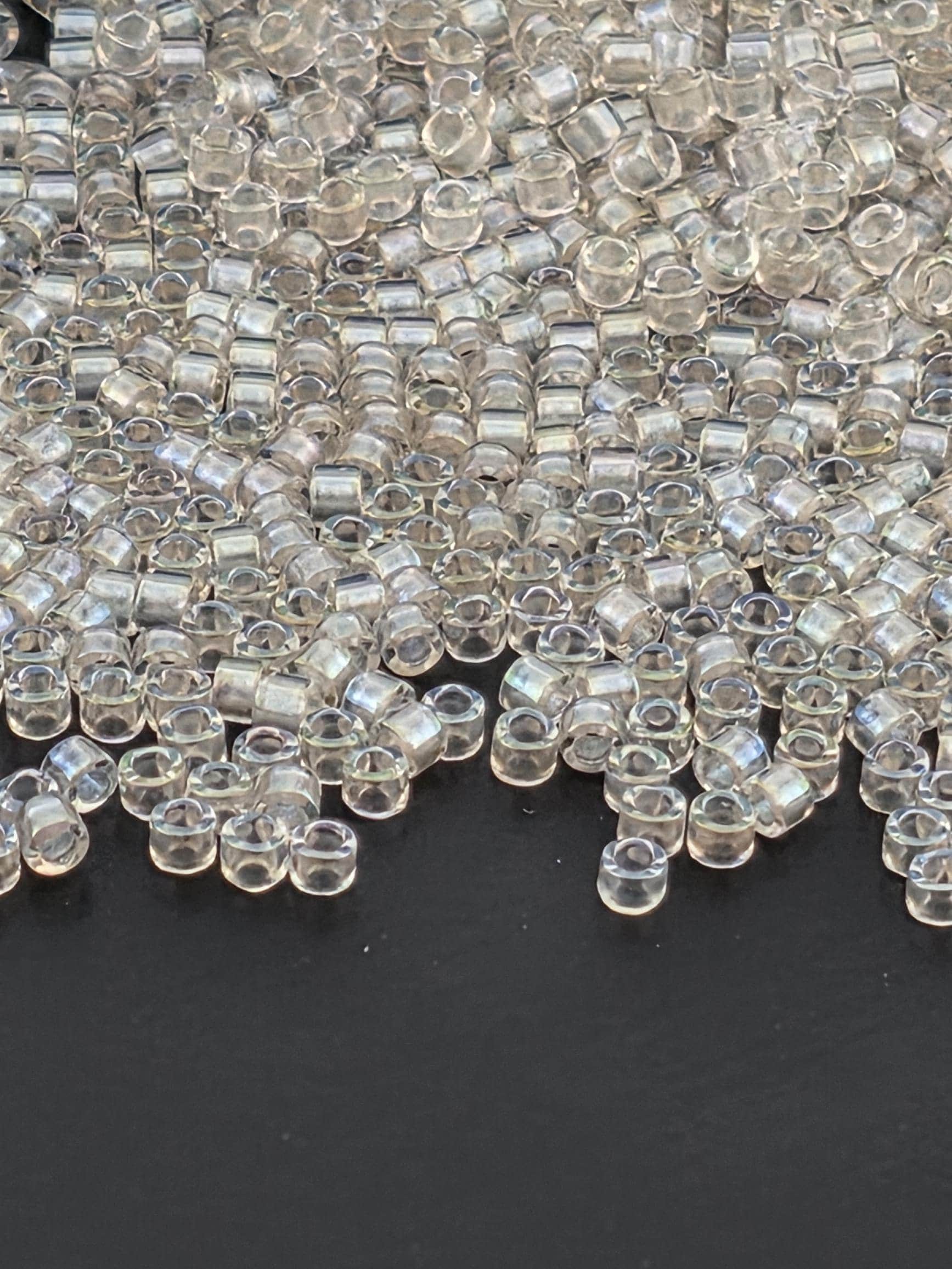 DB1673:Crystal/Cotton Candy Translucent Inside Color Lined Pearl | Size 11/0 | 7g