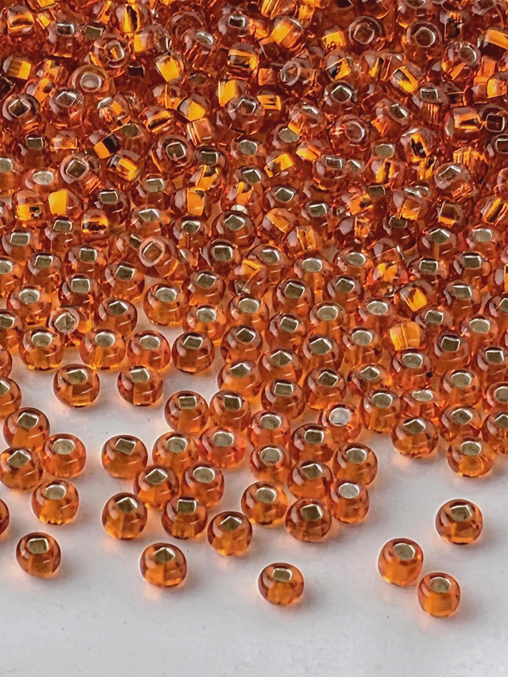 Transparent Copper Lined | Size 11 | 15g | Preciosa-Ornela Glass Seed Beads