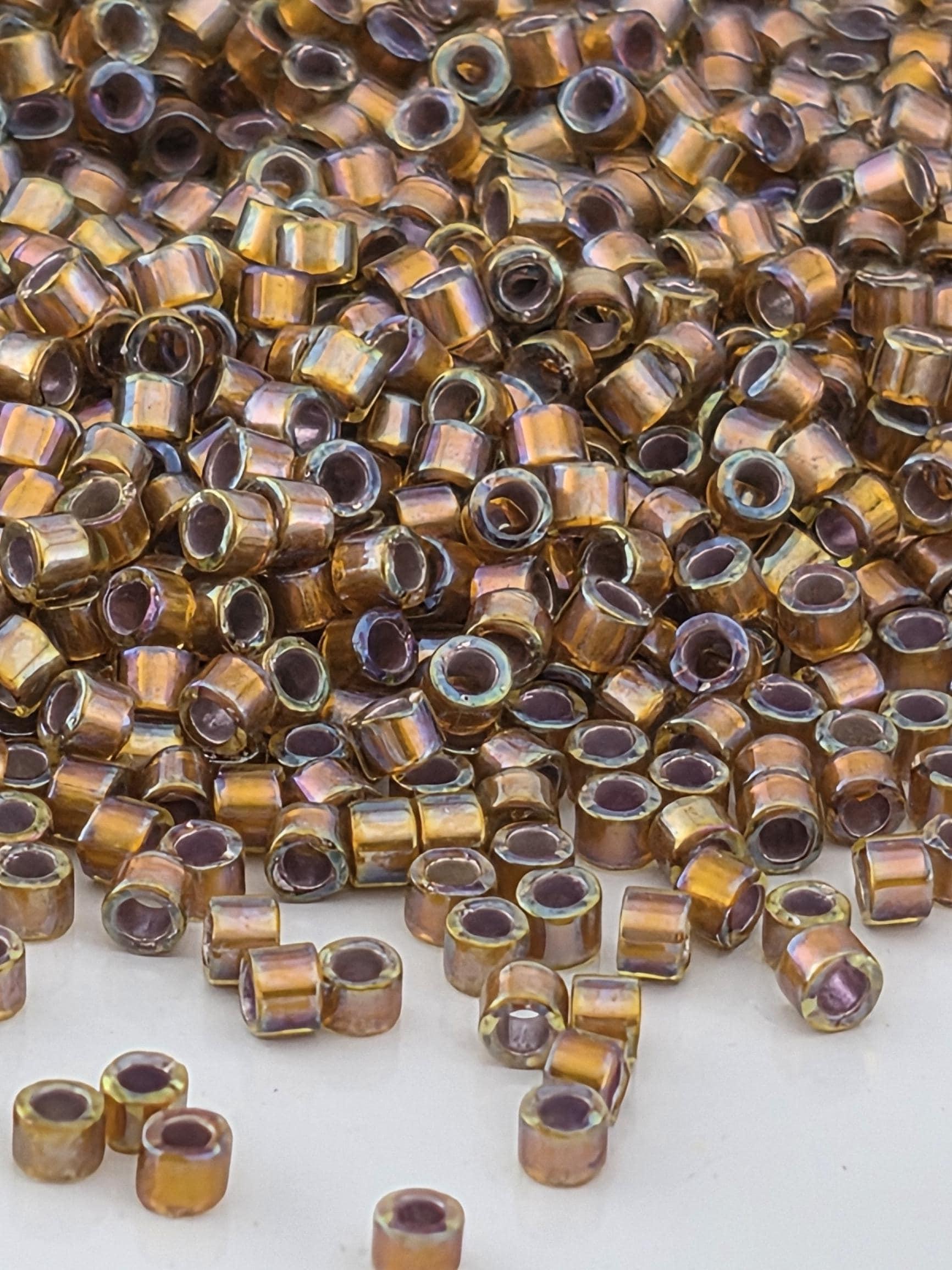 DB1691:Dark Walnut Brown Translucent Silver-Lined Rainbow | Size 11/0 | 7g