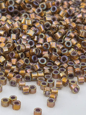 DB1691:Dark Walnut Brown Translucent Silver-Lined Rainbow | Size 11/0 | 7g