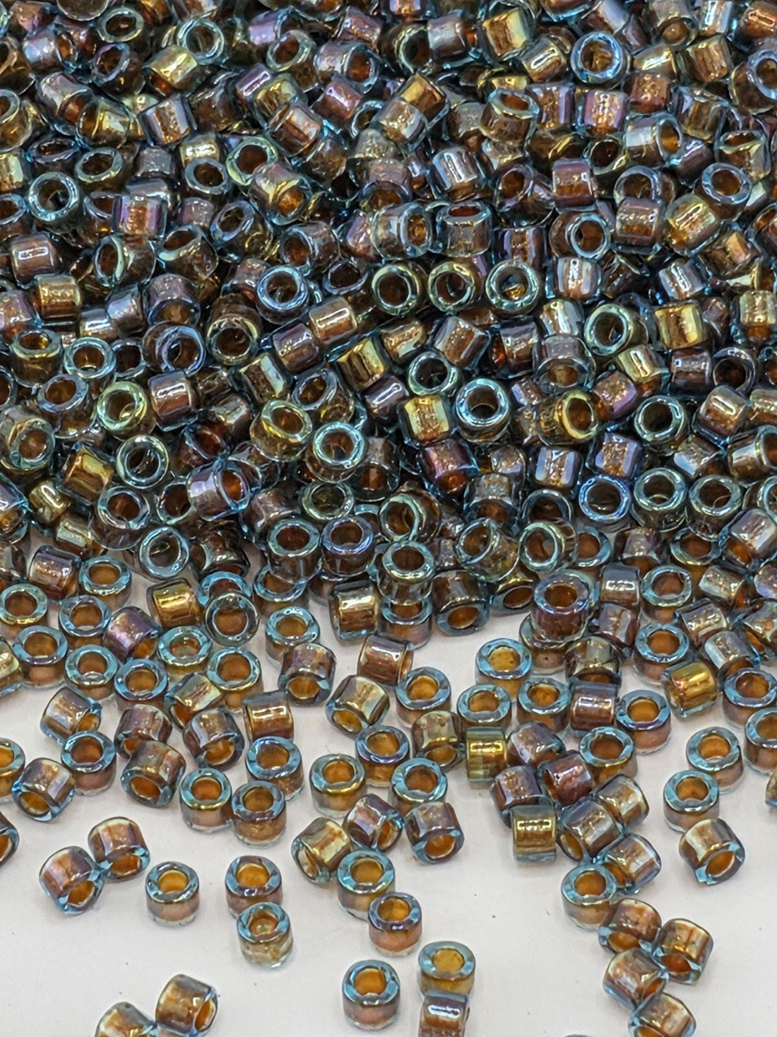 DB1775:Blue/Gold Inside Color Lined Sparkle Rainbow | Size 11/0 | 7g