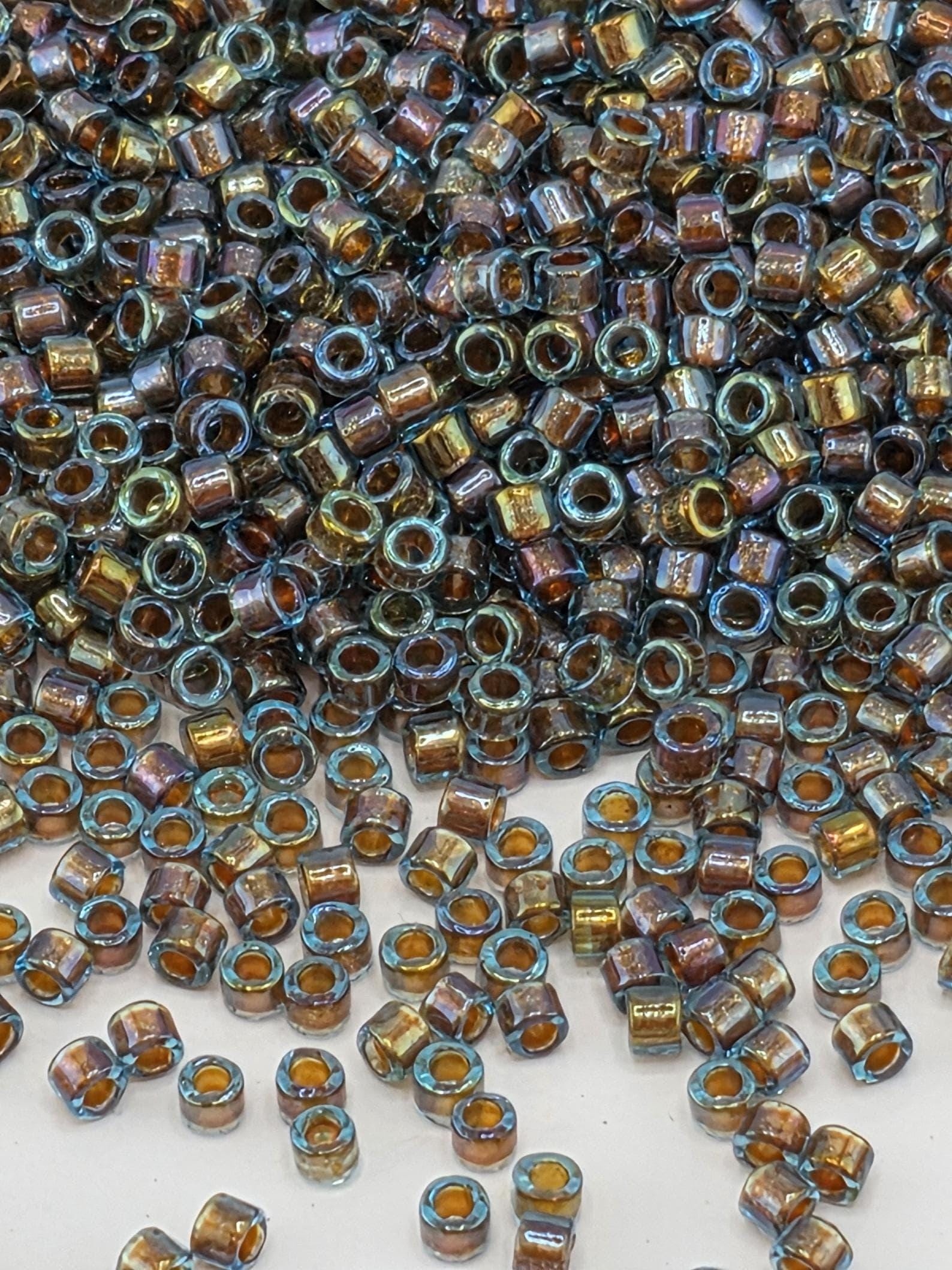 DB1775:Blue/Gold Inside Color Lined Sparkle Rainbow | Size 11/0 | 7g