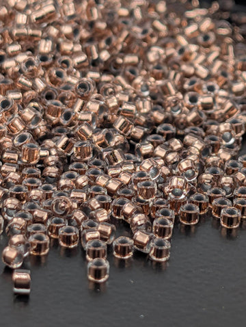 DB0037:Crystal/Copper Inside Color Lined | Size 11/0 | 7g