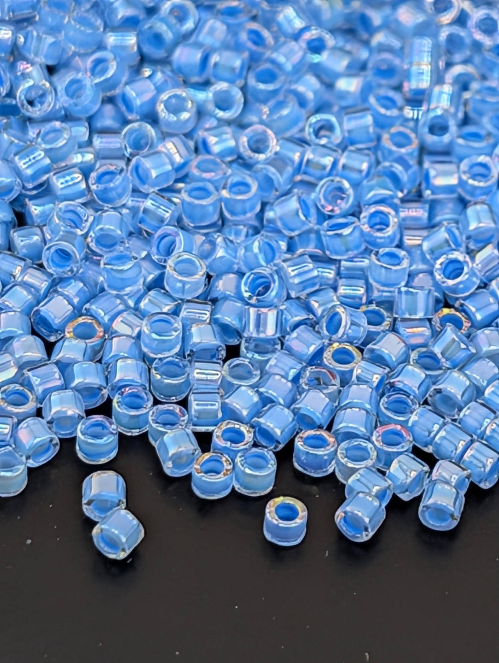 DB0076:Crystal/Medium Blue Inside Color Lined Rainbow | Size 11/0 | 7g
