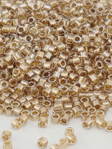 DB0907:Crystal/Taupe Inside Color Lined Sparkle Duracoat | Size 11/0 | 7g