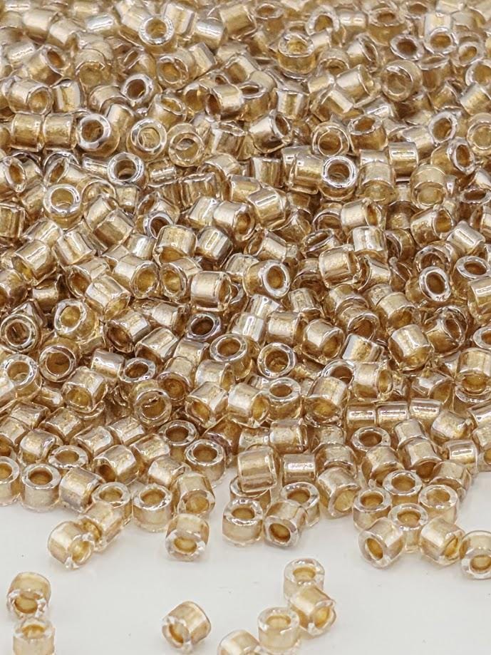DB0907:Crystal/Taupe Inside Color Lined Sparkle Duracoat | Size 11/0 | 7g