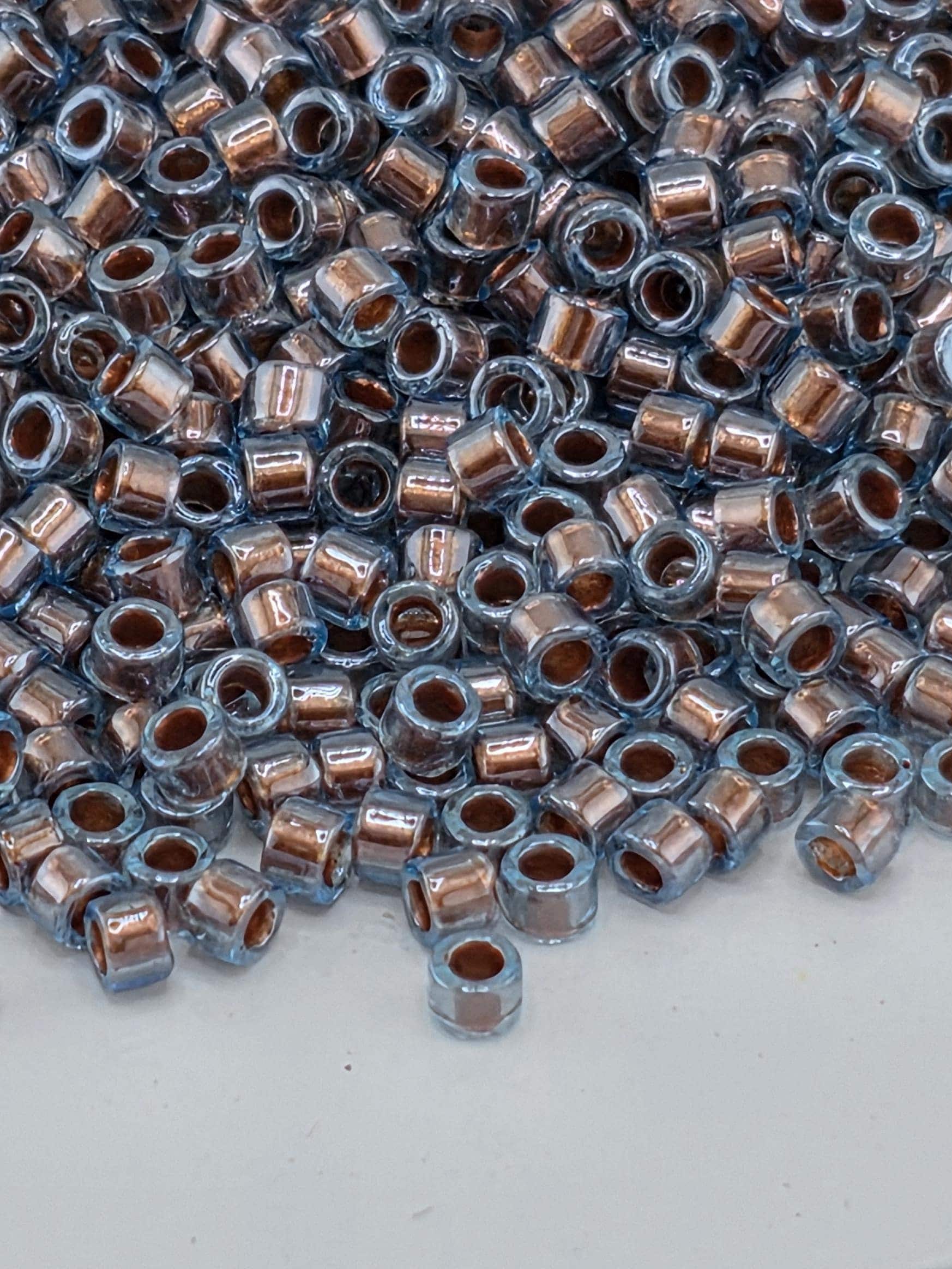 DB1706:Blue/Dark Copper Translucent Inside Color Lined Pearl | Size 11/0 | 7g