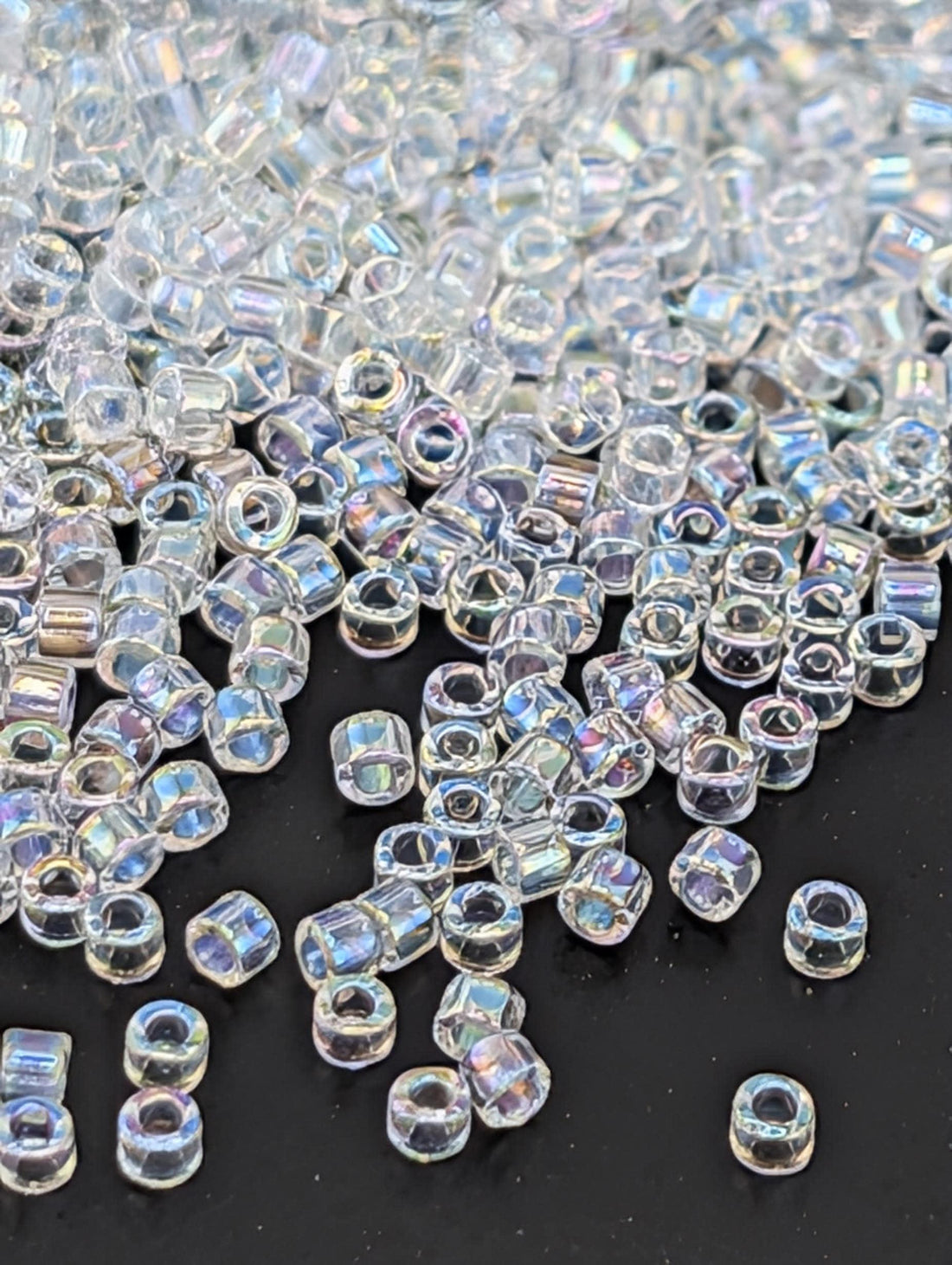 DB0083:Crystal/Pale Blue Inside Color Lined Rainbow | Size 11/0 | 7g