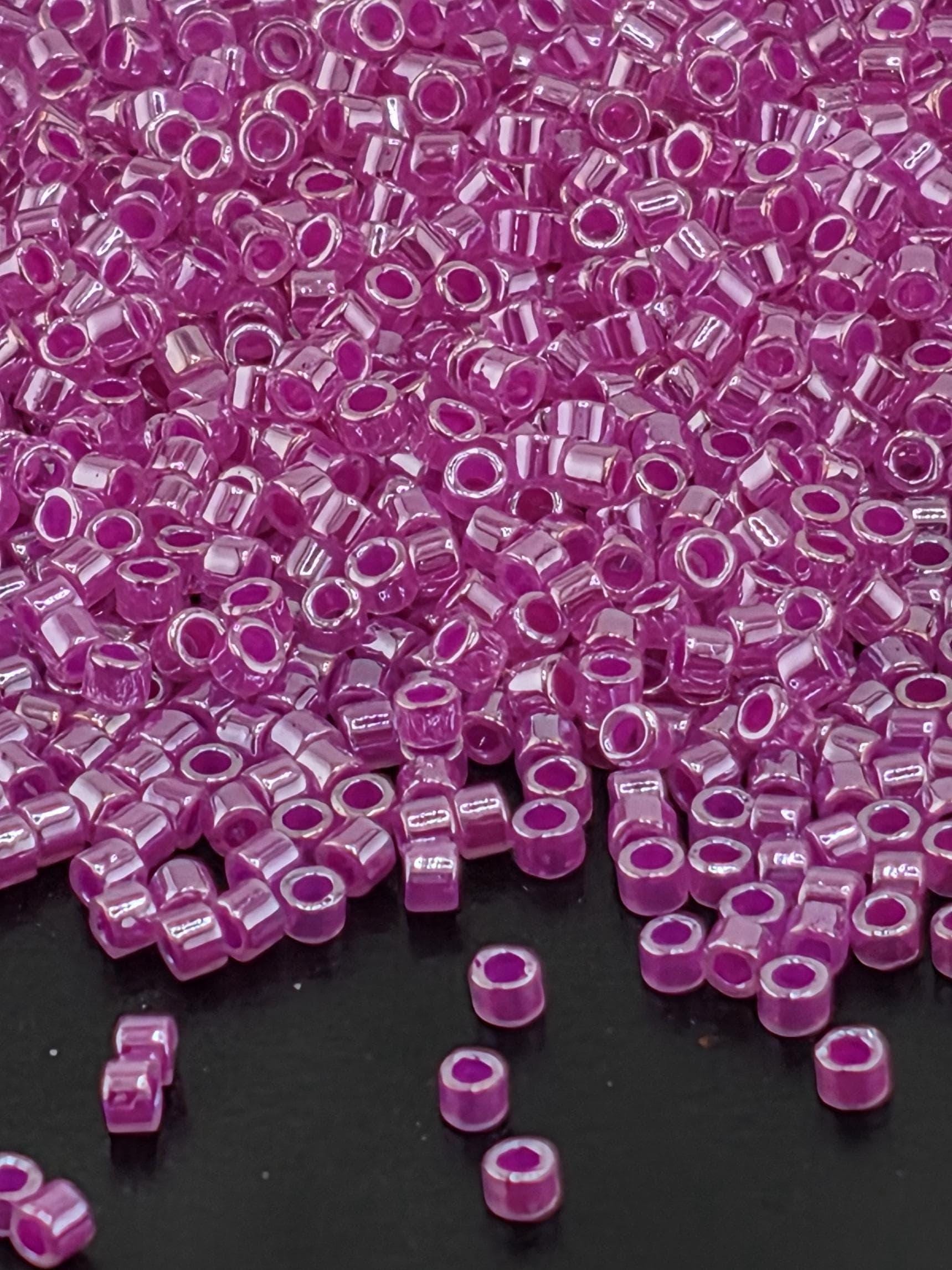 DB0247:Crystal/Fuchsia Inside Color Lined Ceylon | Size 11/0 | 7g