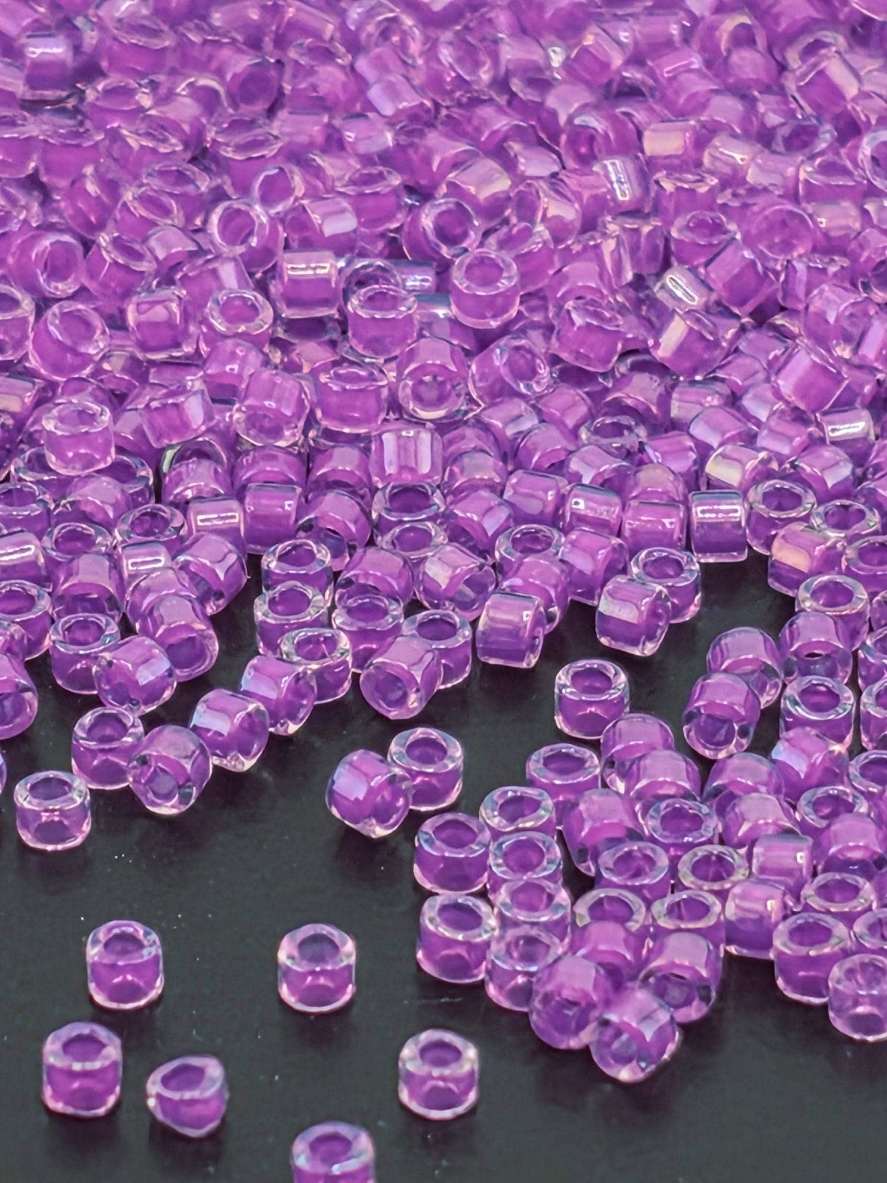 DB0073:Crystal/Dark Lilac Inside Color Lined Rainbow | Size 11/0 | 7g