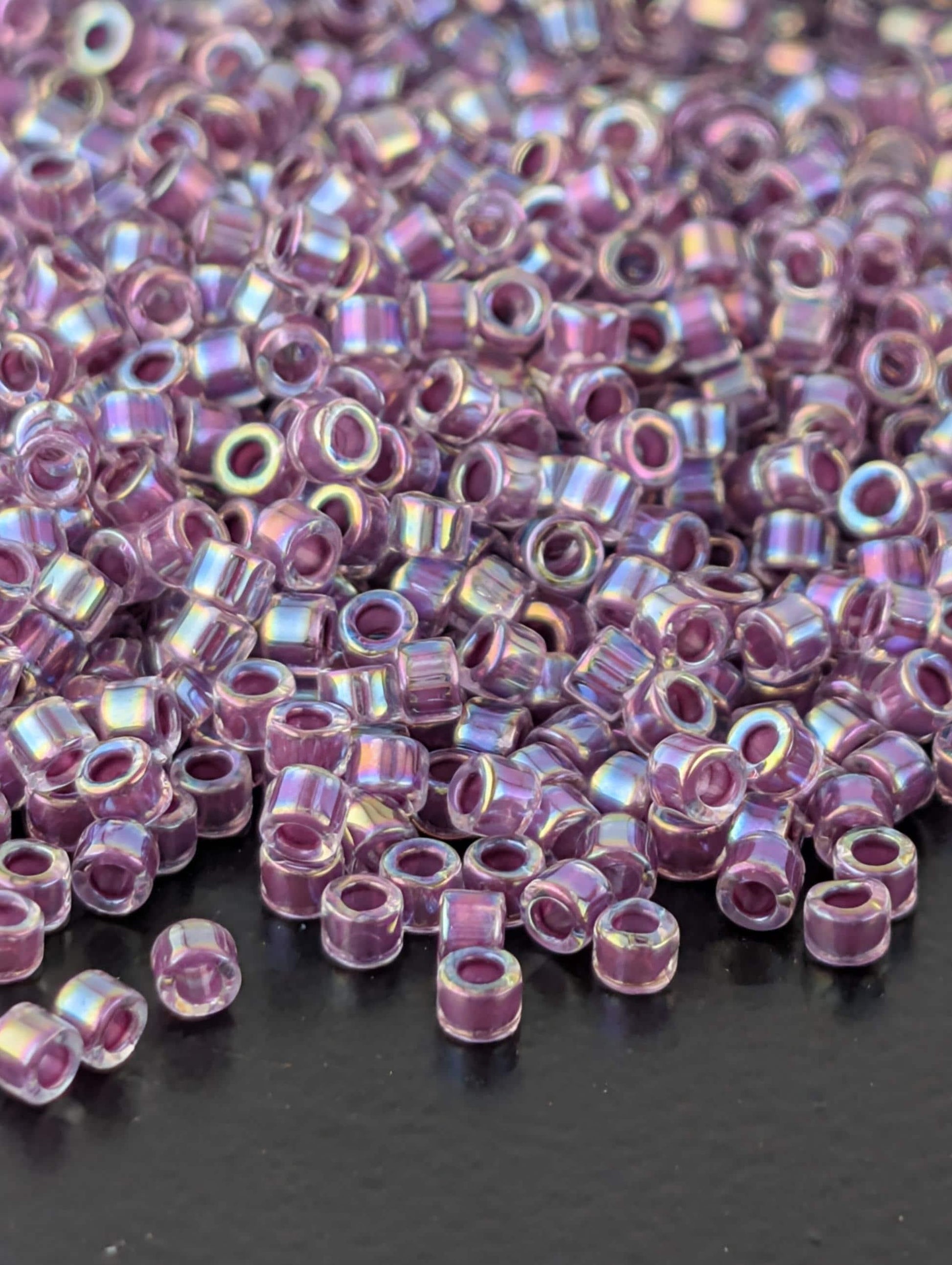 DB0056:Crystal/Lt Magenta Inside Color Lined Rainbow | Size 11/0 | 7g