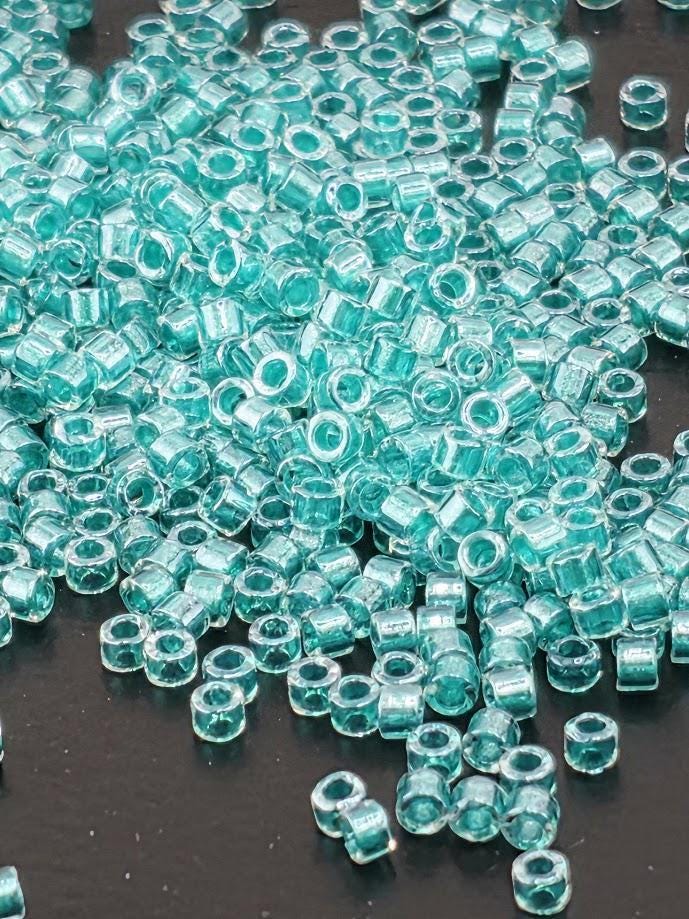 DB0904:Crystal/Aqua Inside Color Lined Sparkle Duracoat | Size 11/0 | 7g