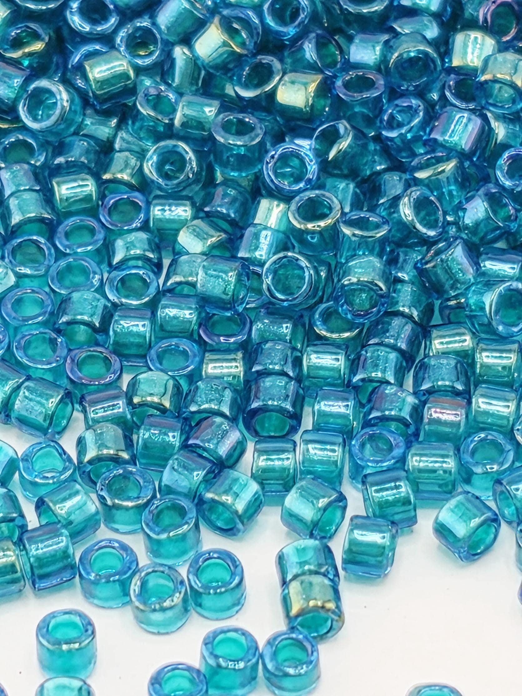 DB1764:Azure/Hawaiian Blue Inside Color Lined Sparkle Rainbow | Size 11/0 | 7g