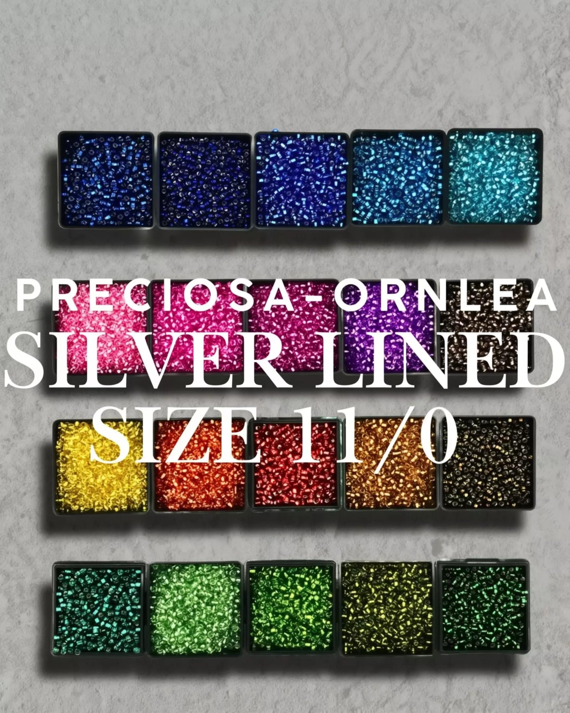 a collection of silver lined gemstones in various colors, including blue, purple, green, orange, and yellow.
