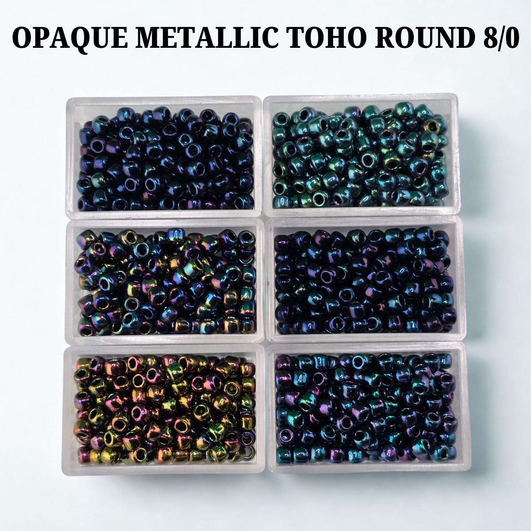 six clear plastic containers filled with multicolored metal beads, arranged in two rows of three.