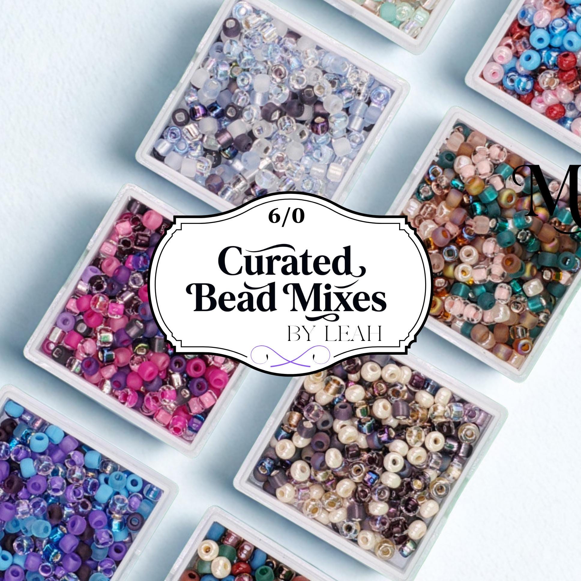 an assortment of colorful beads in various shapes and sizes, arranged in multiple containers.