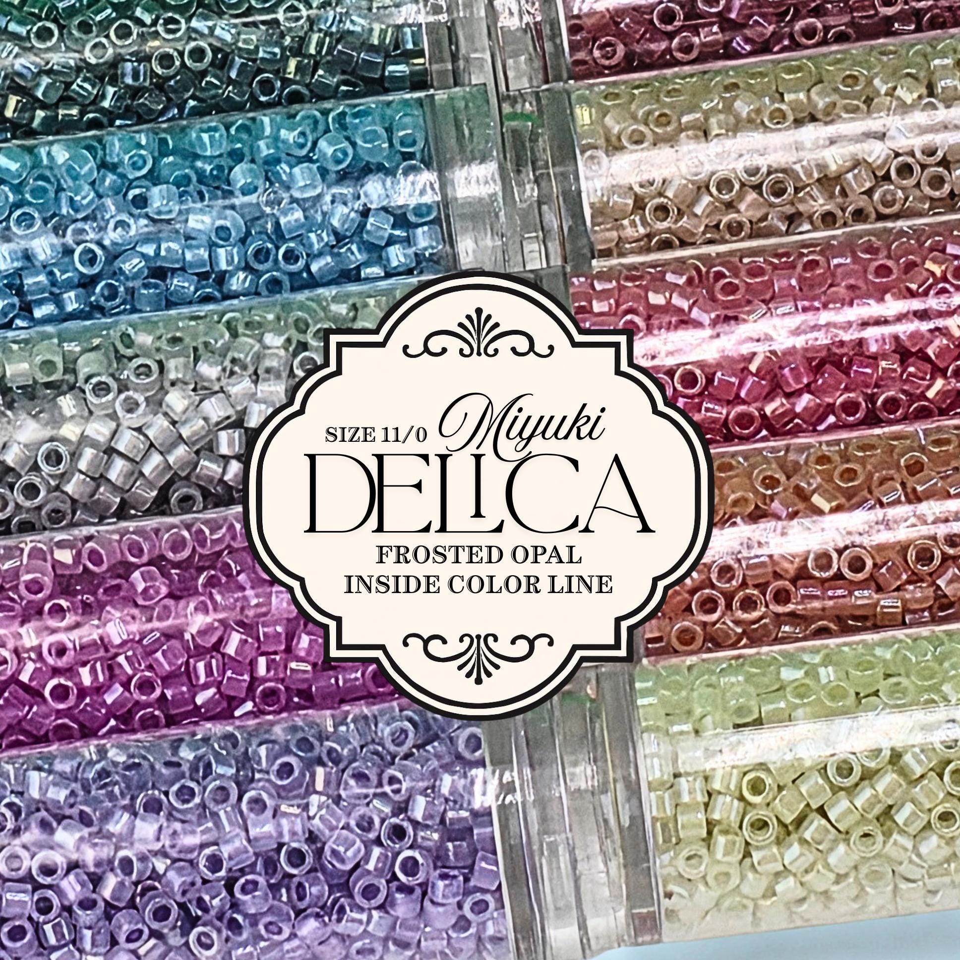 a collection of colorful beads, including various shades of purple, blue, green, and yellow, arranged in a visually appealing manner.