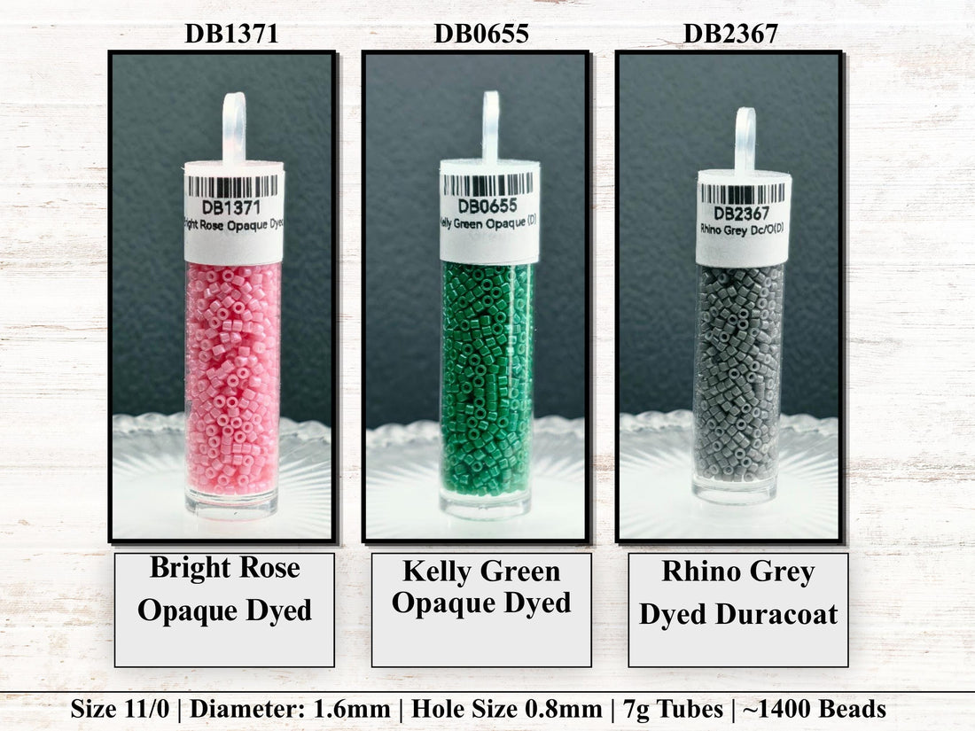 a collection of colorful glass beads in various sizes and colors, arranged in rows and columns. The beads are labeled with numbers and text, indicating their sizes and possibly their names or types. The image does not contain any text that can be described in fewer than 500 characters, and it does not include any phrases like 'The image depicts', 'The image displays', 'The image shows', 'In the image', 'The image captures', 'The image features', or