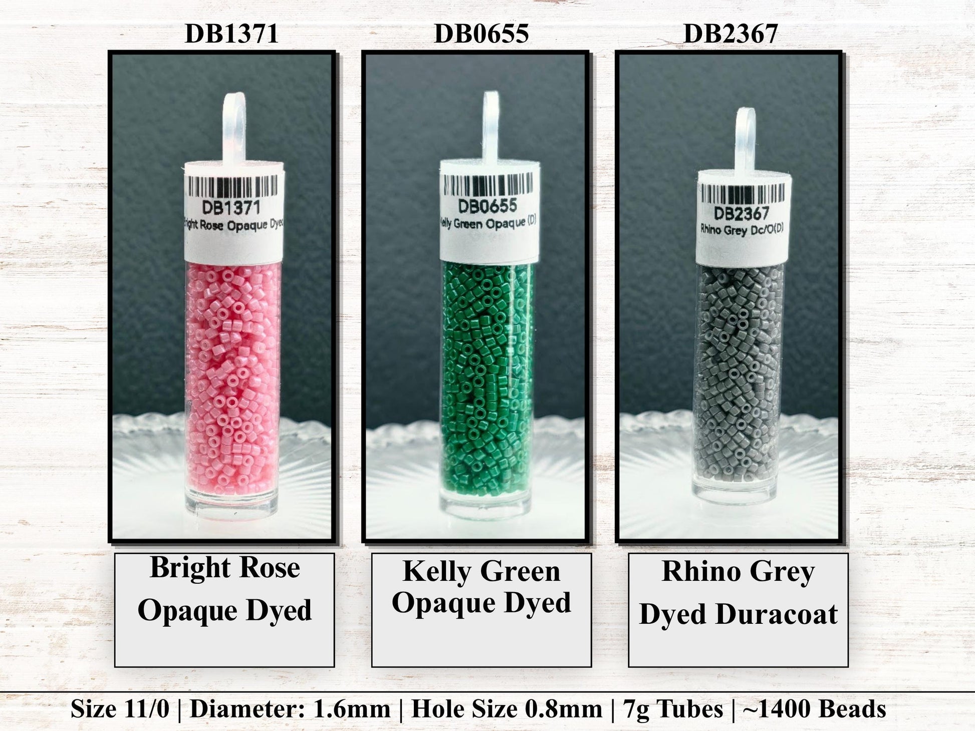 three different colored glass vials containing dyed beads, each labeled with its size and color.