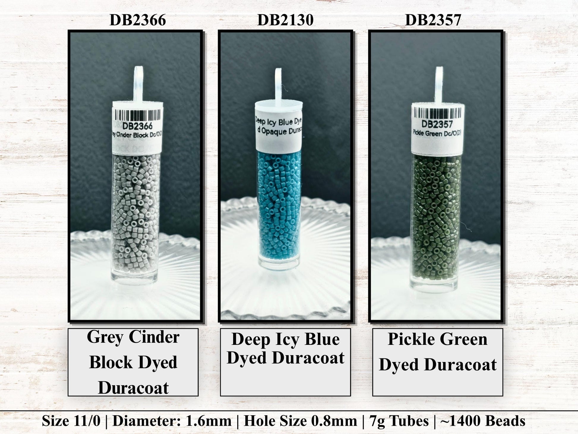 three different colored beads in clear vials, each labeled with its size and hole size.