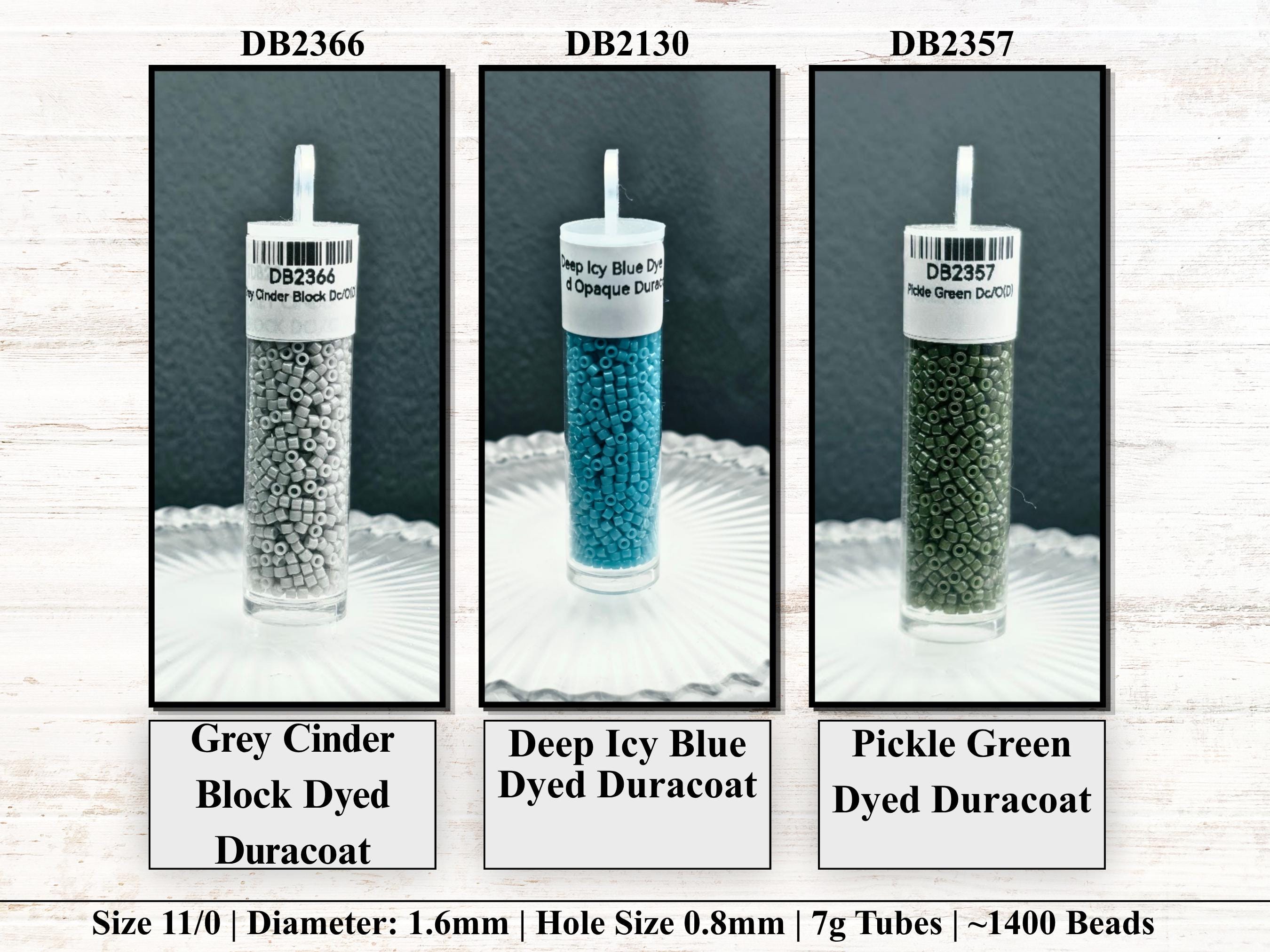 three different colored beads in clear vials, each labeled with its size and hole size.