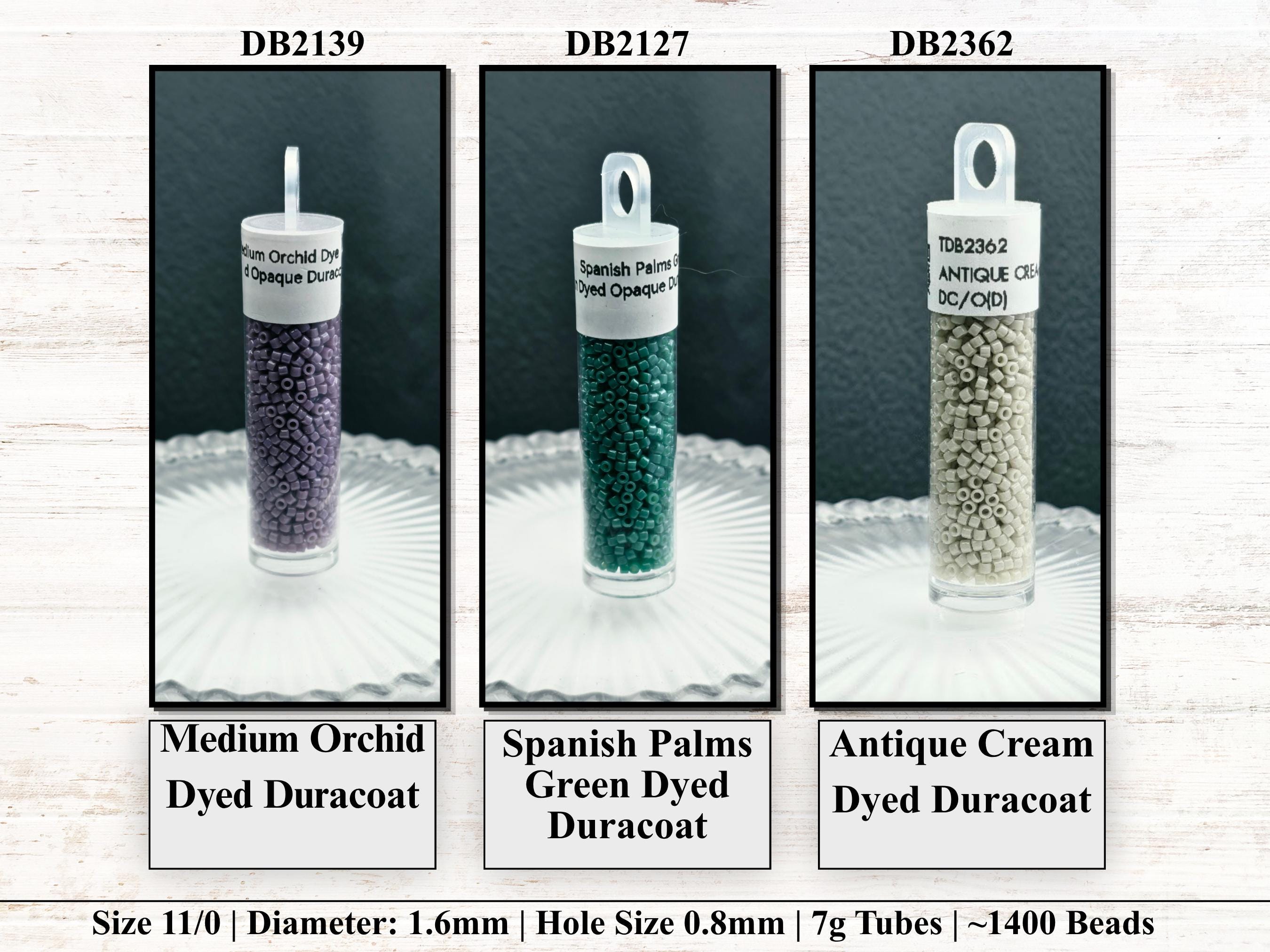 three different types of dyed Duracoats, each with a unique color and size. The first one is a medium-sized orchid dyed Duracoat, the second one is a Spanish Palm Dye Duracoat, and the third one is an antique cream dyed Duracoat. The image also includes text providing information about the sizes and hole sizes of the Duracoats.