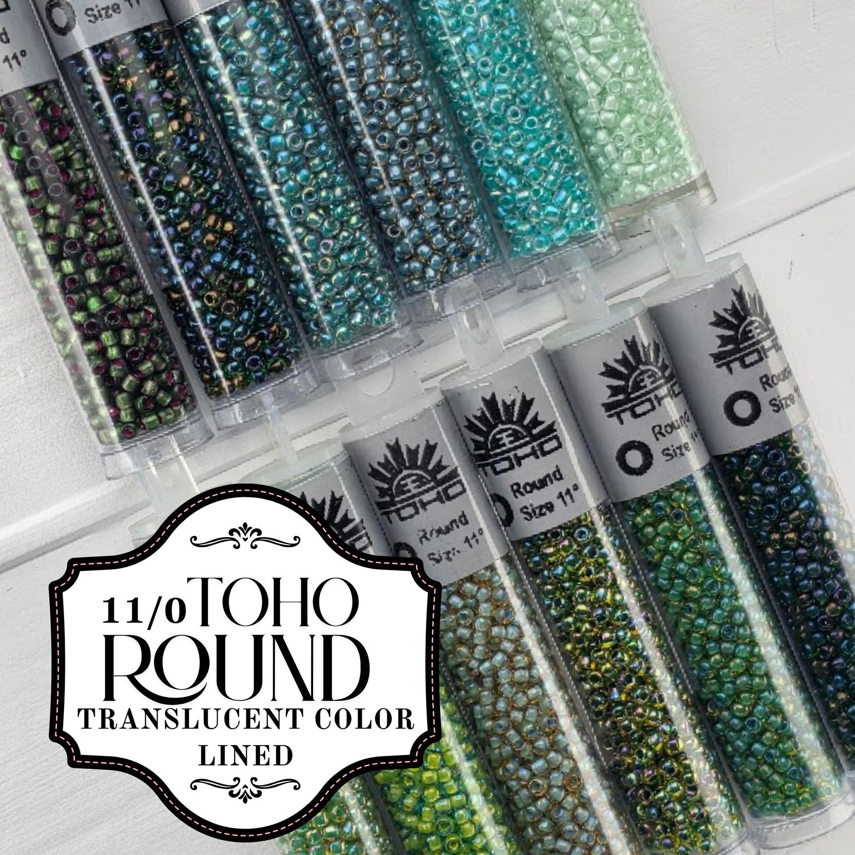 a collection of transparent bead tubes filled with various colored beads, arranged in rows.