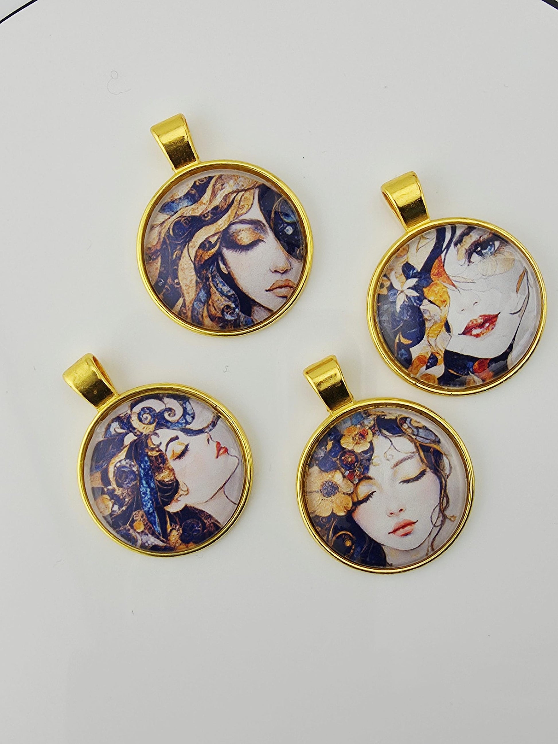 four circular pendants with gold-colored frames, each featuring a different artistic design.