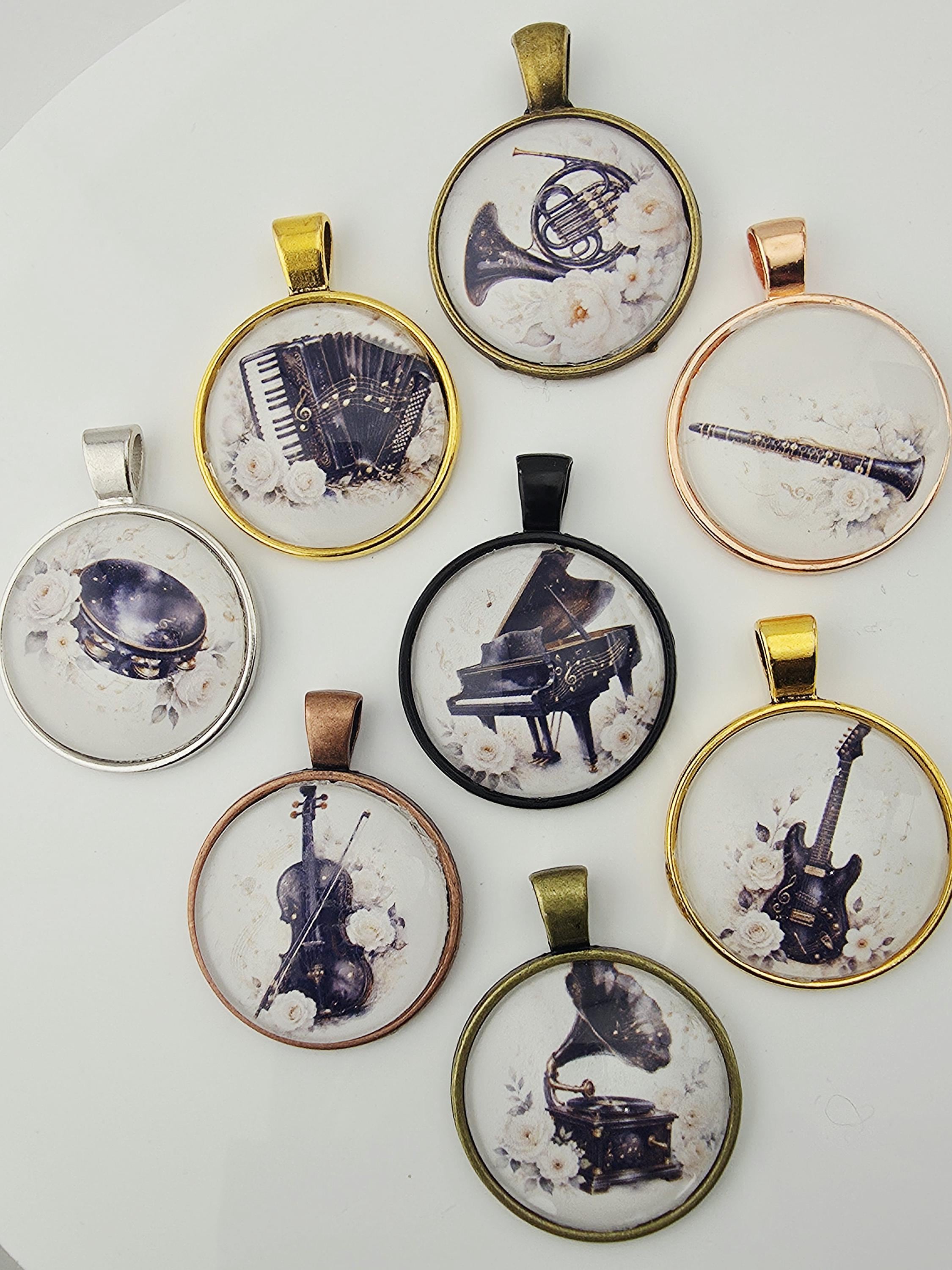 nine pendants or charms, each featuring a different musical instrument. The pendants are arranged in a circular pattern, with each one displaying a different instrument, such as a trumpet, piano, and guitar.
