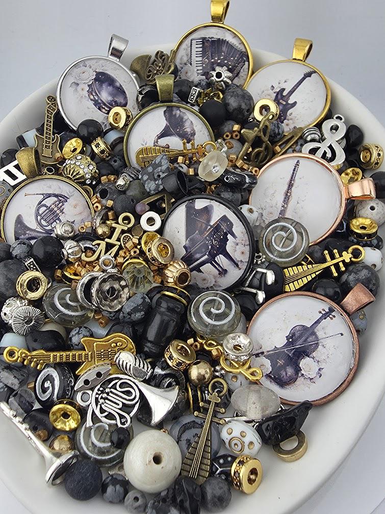 The image is a collage of various musical instruments and accessories, including brass instruments, strings, and beads, all arranged in a visually appealing manner.
