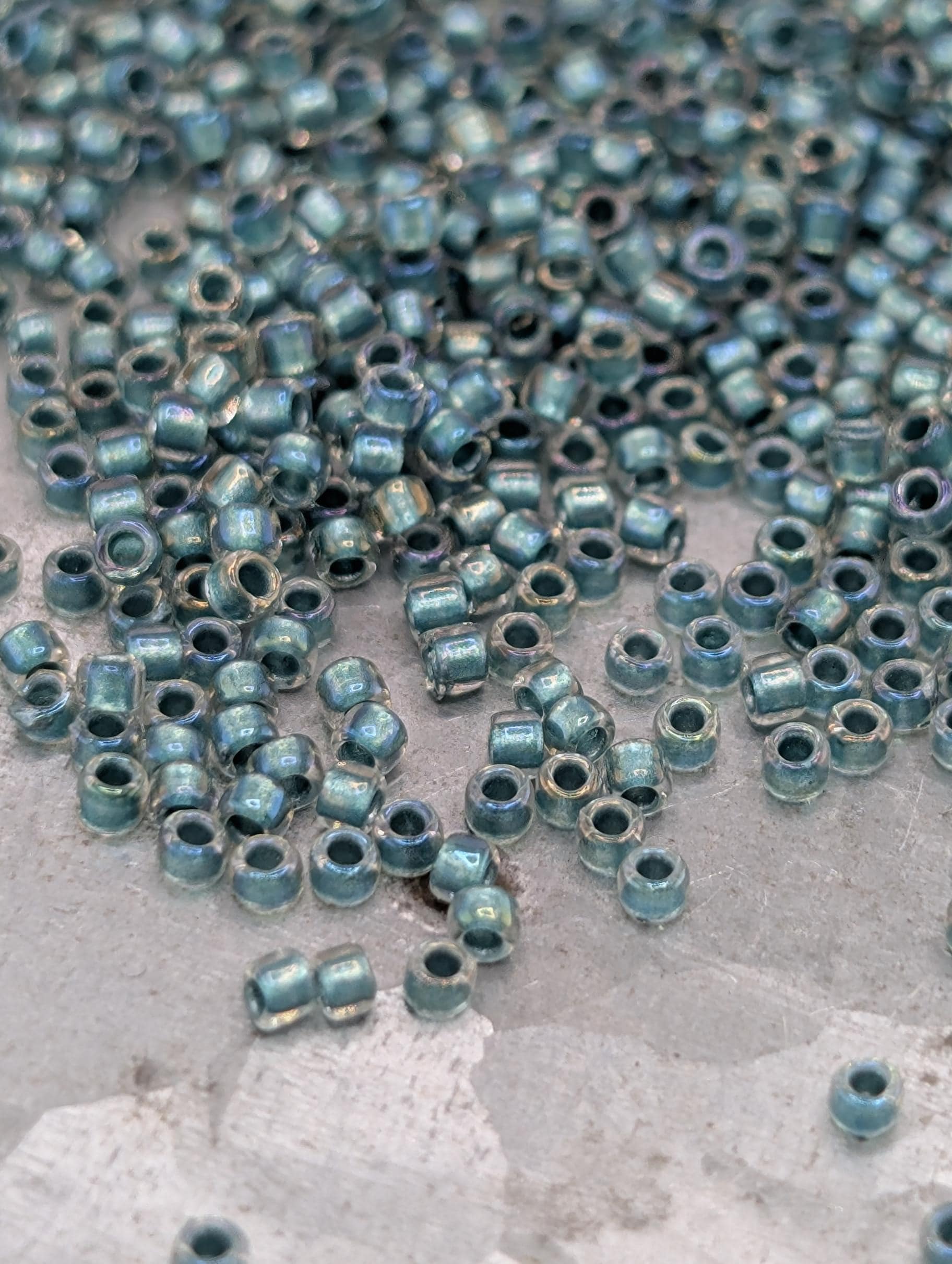 Inside-Color Rainbow Crystal/Teal-Lined Size 15/0 Toho Round 2.5" tube