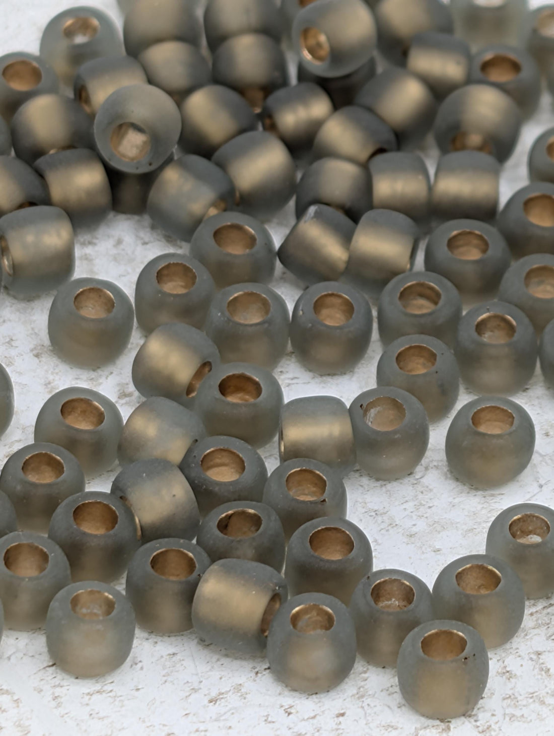 Toho 6/0 Round: Gold-Lined Frosted Black Diamond 2.5" Tube
