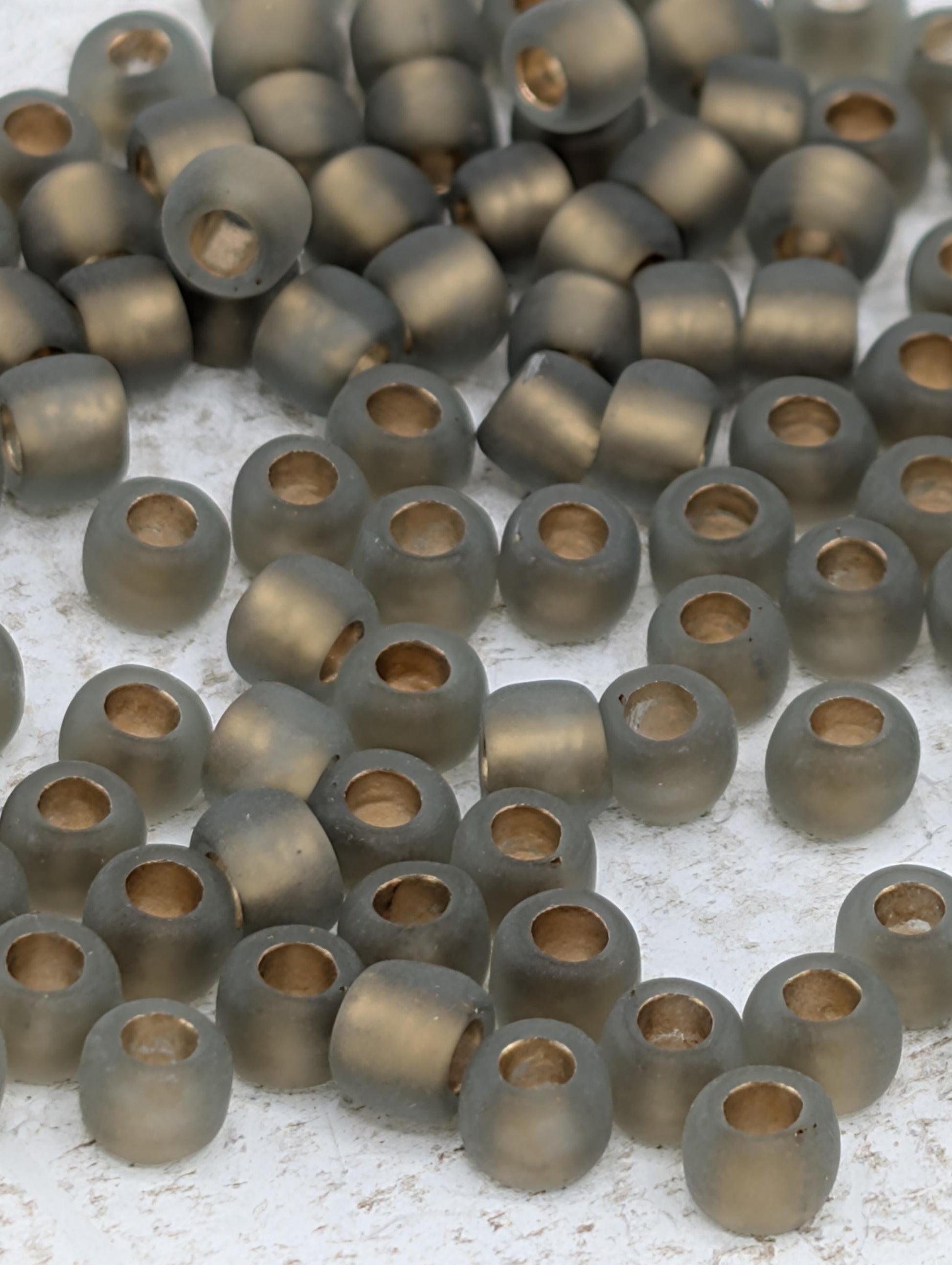 Toho 6/0 Round: Gold-Lined Frosted Black Diamond 2.5" Tube