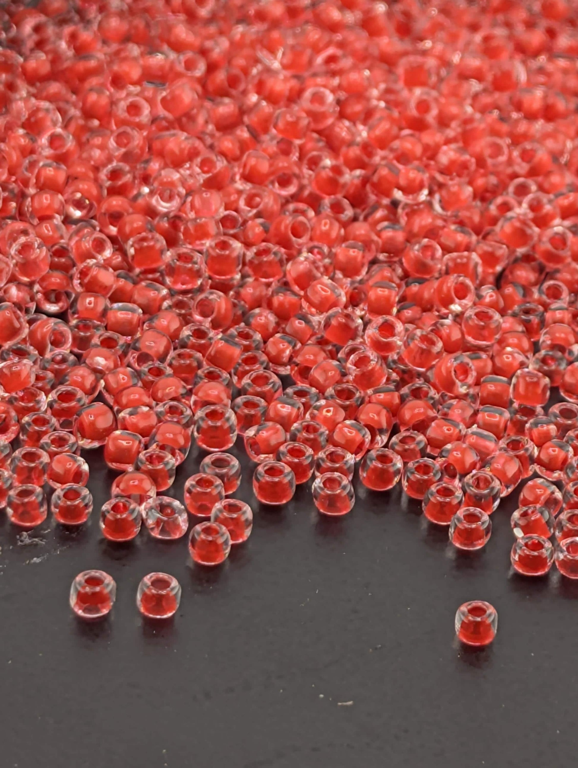 Matsuno Seed Beads: Translucent Inside Dyed Red - 11/0 Round Glass