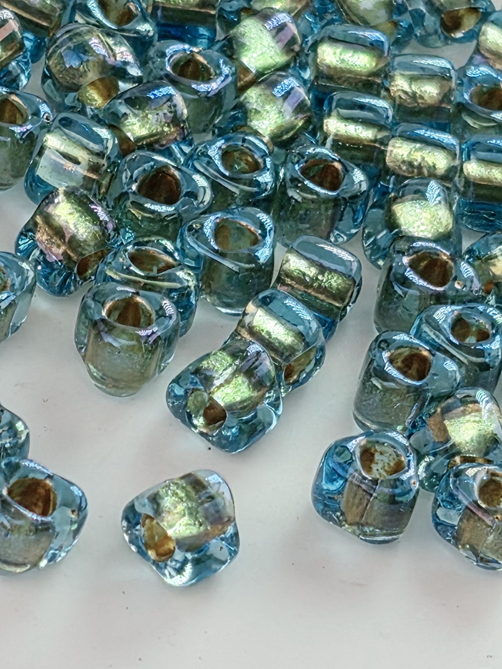 Blue/Bronze Inside Color Lined Sparkle Miyuki Triangle Size 5/0 (15g Pkg)