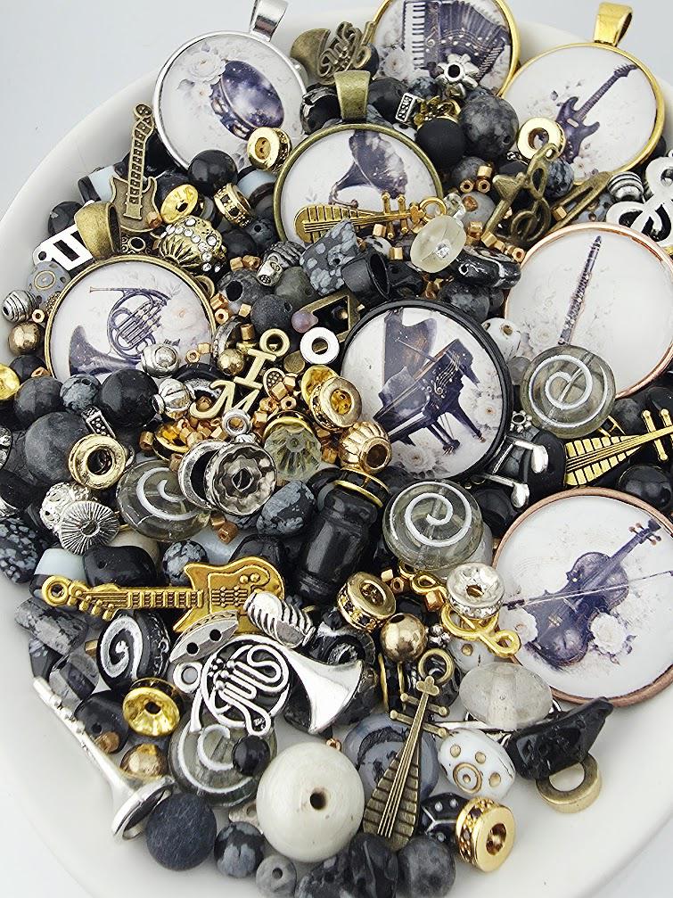 The image is a collage of various musical-themed objects, including musical instruments, beads, and other decorative elements, all arranged on a white surface.