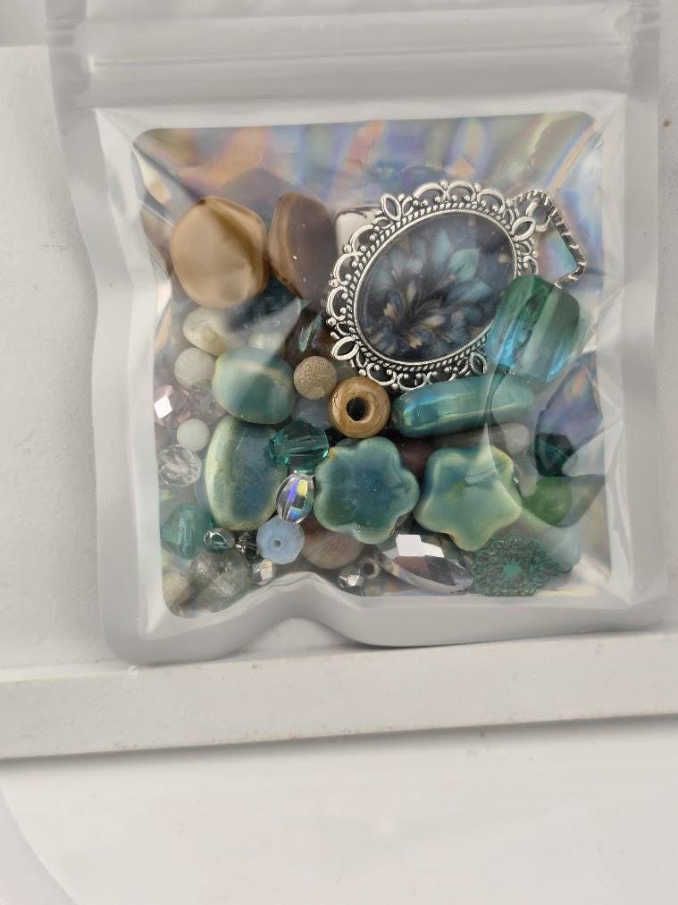 Glass Bead Soup Mix - Raven's Tide | Teal and Abalone Shell Glass Beads | Blue Raven and Abalone Heart Pendants | DIY Jewelry Making Supply