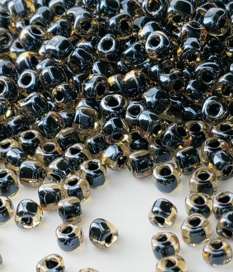 Amber/Black Inside Color Lined Miyuki Triangle Size 8/0 (15g Pkg)