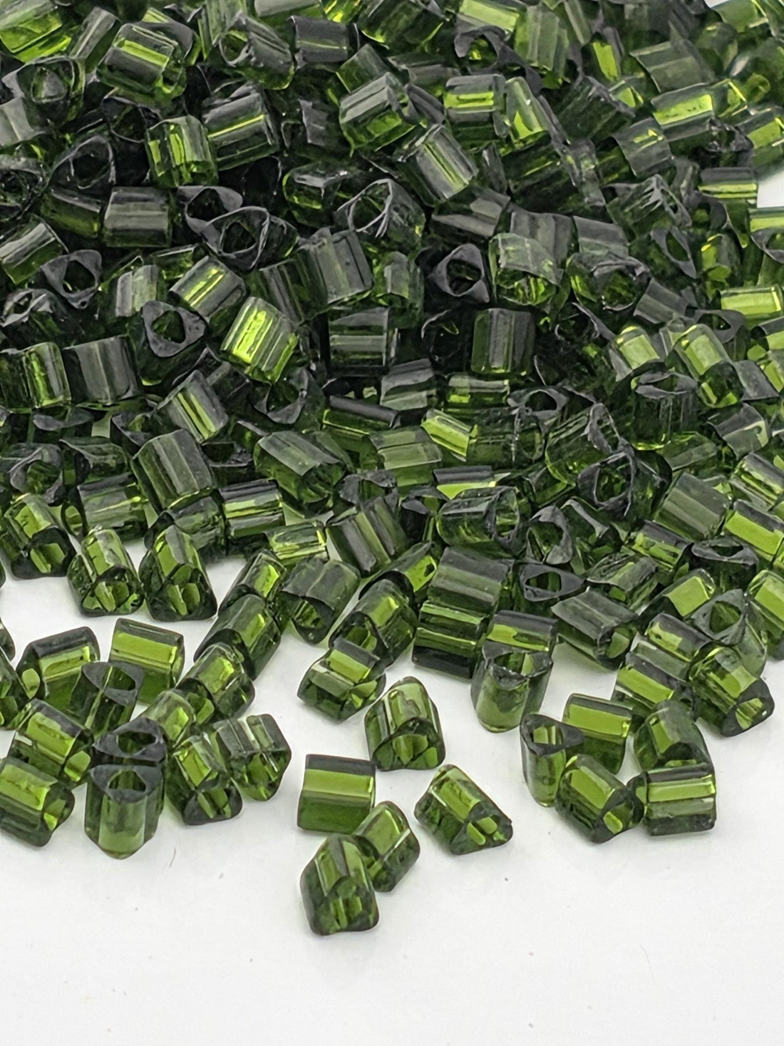 TOHO Triangle 11/0 Transparent Olivine 2.5 Tube