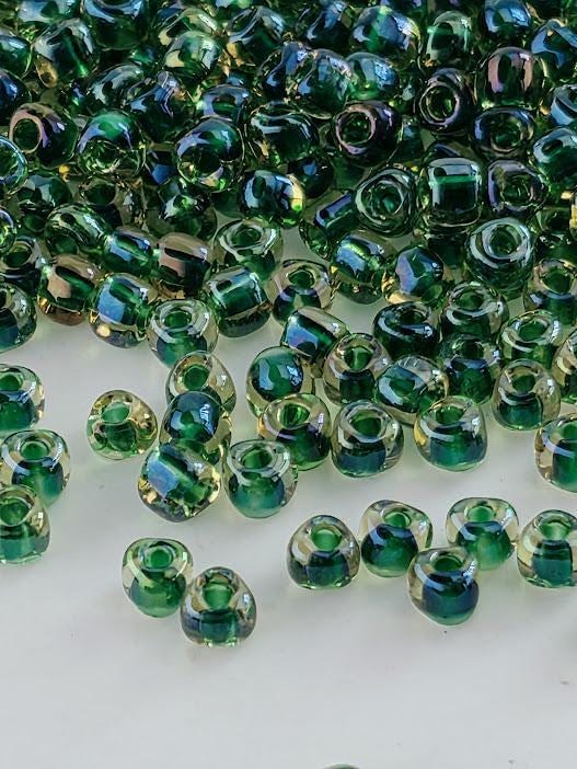 Amber/Green Inside Color Lined Miyuki Triangle Size 8/0 (15g Pkg)