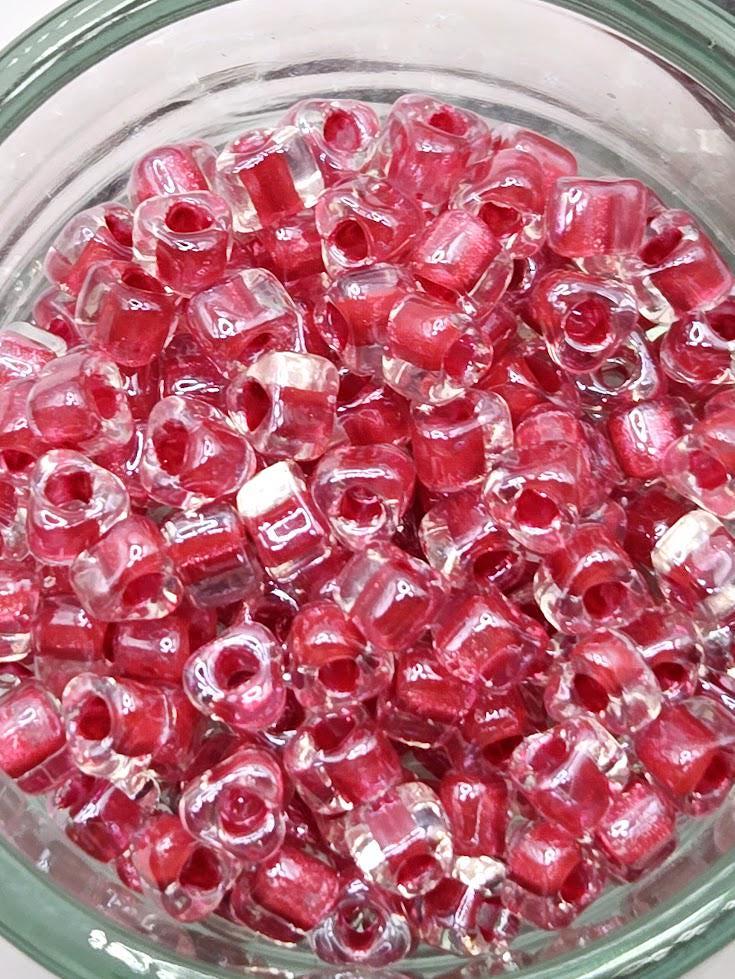 Crystal/Dark Rose Inside Color Lined Sparkle Miyuki Triangle Size 5/0 (15g Pkg)