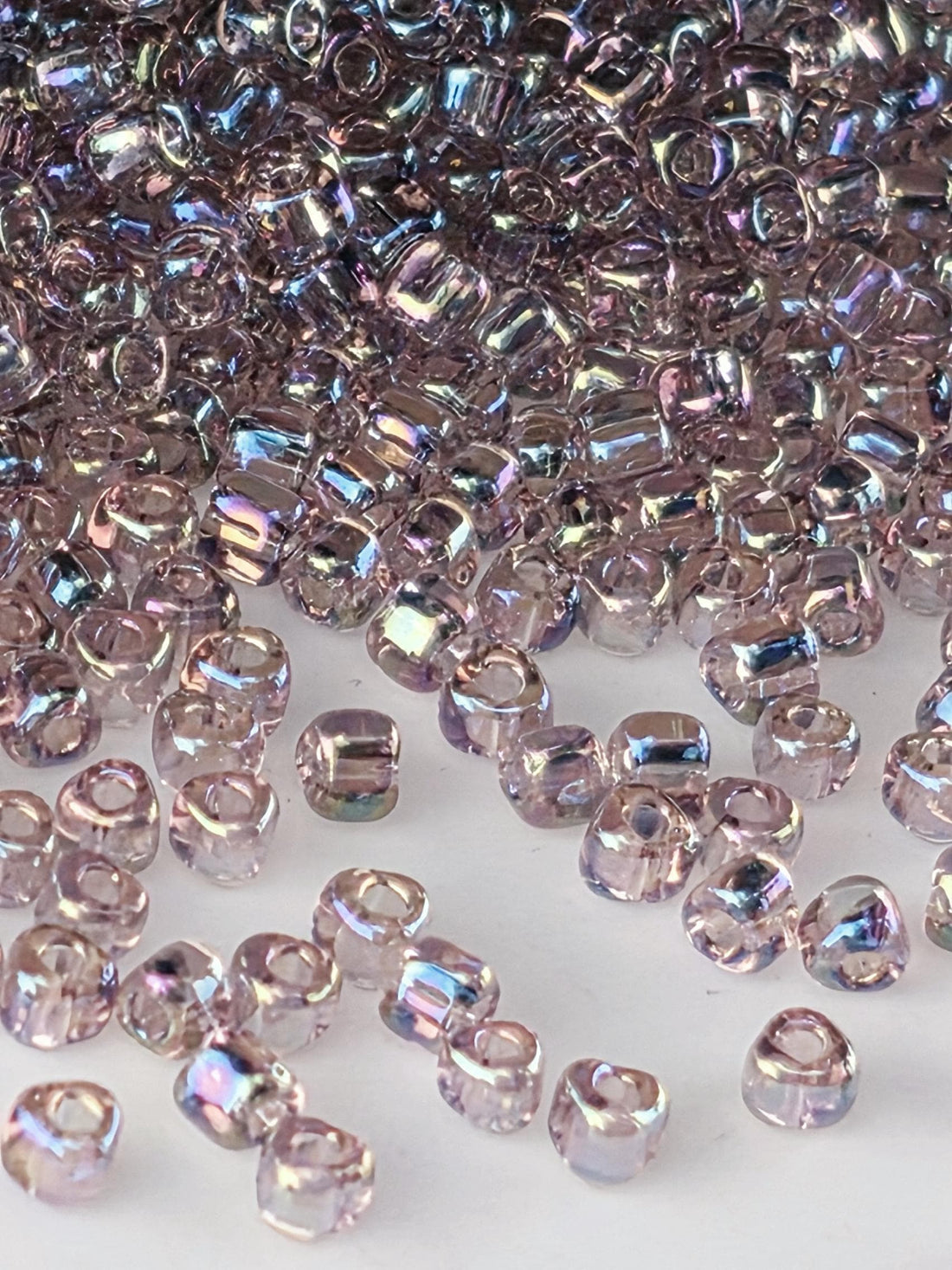 Light Amethyst Translucent Rainbow Miyuki Triangle Size 8/0 (15g Pkg)