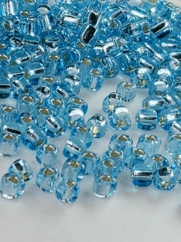 Blue Topaz Translucent Silver Lined Miyuki Triangle Size 8/0 (15g Pkg)