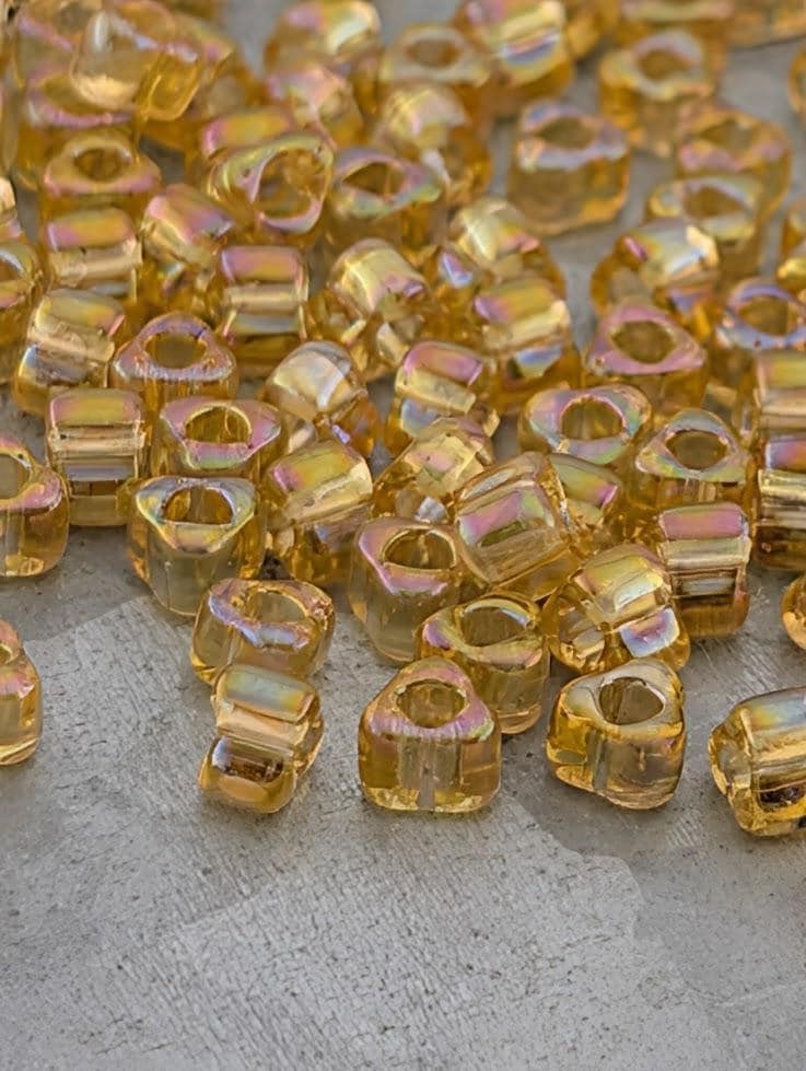Light Gold Translucent Rainbow Miyuki Triangle Size 5/0 (15g Pkg)