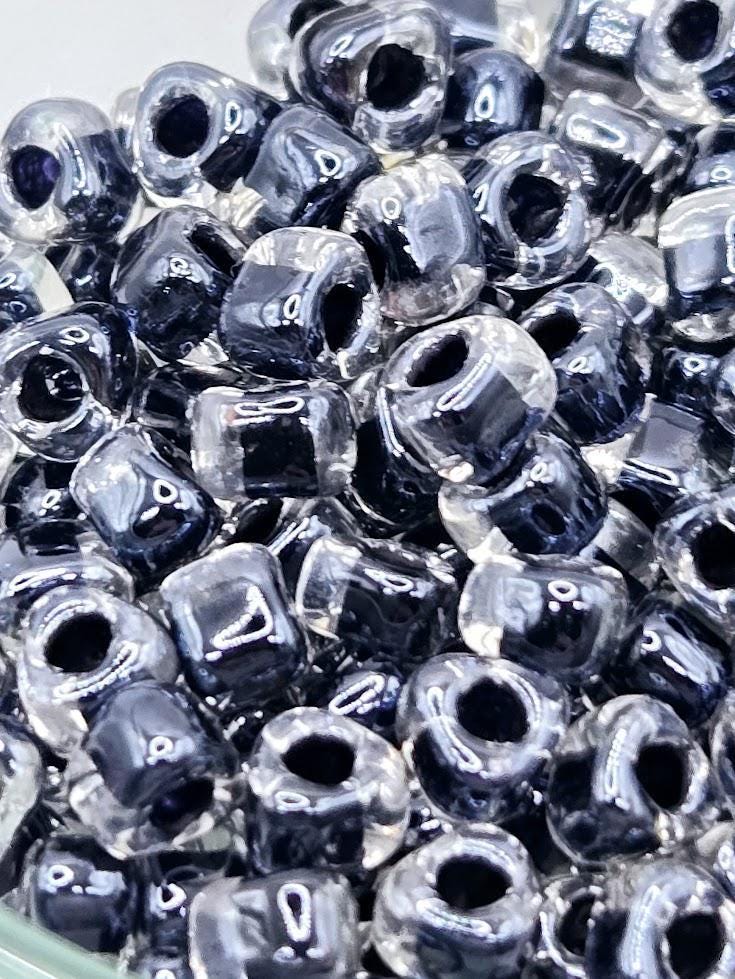 Crystal/Black Inside Color Lined Miyuki Triangle Size 5/0 (15g Pkg)