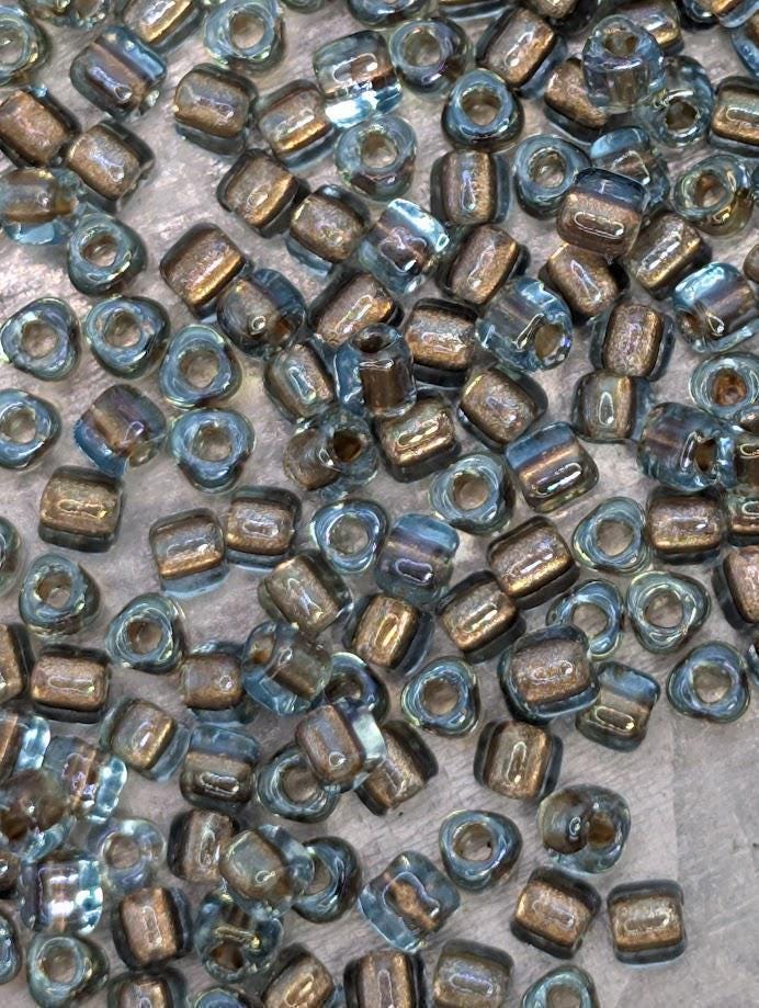 Blue/Bronze Inside Color Lined Sparkle Miyuki Triangle Size 10/0 (15g Pkg)