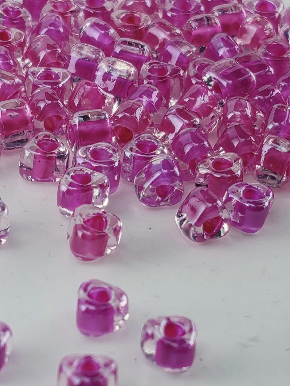 Crystal/Fuchsia Inside Color Lined Miyuki Triangle Size 5/0 (15g Pkg)